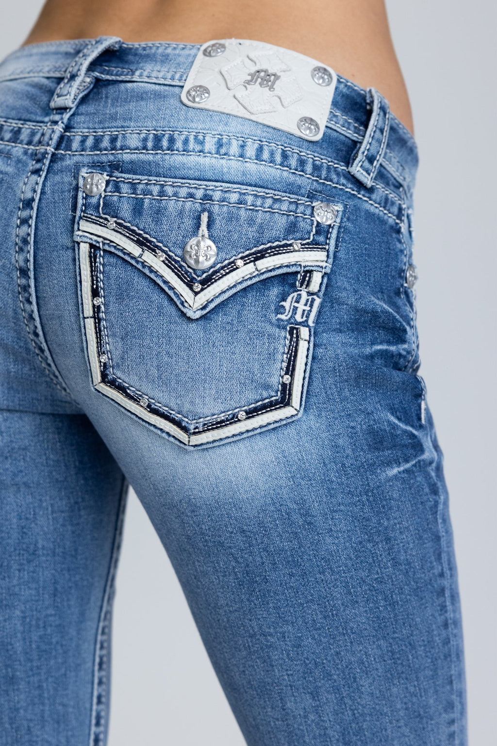 Halo Border Stitched Low Rise Bootcut Jeans